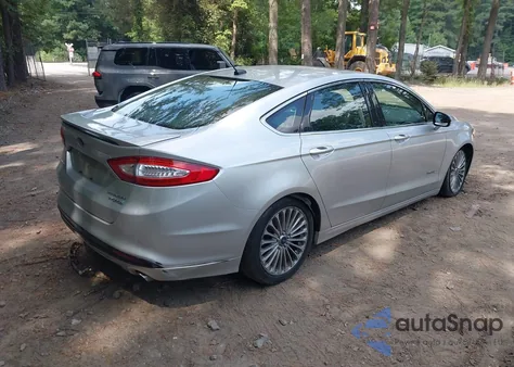 2013 Ford Fusion Hybrid Titanium z USA, uszkodzony, nr VIN 3FA6P0RU2DR302347